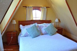 Ένα ή περισσότερα κρεβάτια σε δωμάτιο στο Hotel Brighton