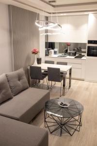 A kitchen or kitchenette at Pupin Palace Apartments