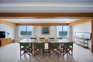 Телевизор и/или развлекательный центр в JANEIRO Hotel