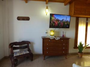 Μια τηλεόραση ή/και κέντρο ψυχαγωγίας στο Oasis Cochera opcional
