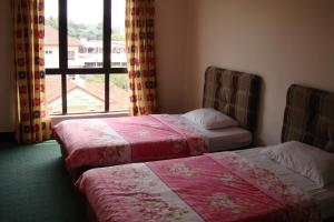 Lova arba lovos apgyvendinimo įstaigoje Dorcas Service Apartment - Marina Court