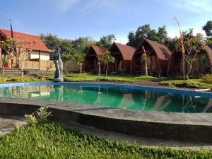 Bazén v ubytování Kintamani Cabins nebo v jeho okolí
