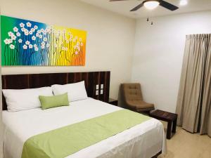 Postel nebo postele na pokoji v ubytování Imperla Hotel