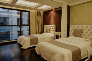 Tempat tidur dalam kamar di Ring Service Apartment 798 Art Zone