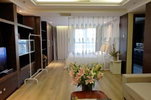 Televisi dan/atau pusat hiburan di Ring Service Apartment 798 Art Zone