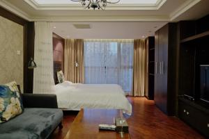 Tempat tidur dalam kamar di Ring Service Apartment 798 Art Zone