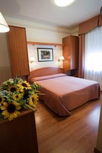 Postel nebo postele na pokoji v ubytování Hotel Villa Mulino ***S + 17 fotografií