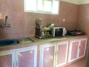 Kuhinja ili čajna kuhinja u objektu Al Wafa House