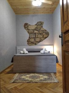 Postel nebo postele na pokoji v ubytování Guesthouse Litoros