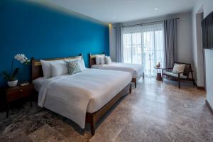 Giường trong phòng chung tại Salmalia Boutique Hotel & Spa