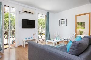 TV a/nebo společenská místnost v ubytování Stay U-nique Apartments Sicília