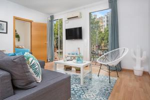 TV a/nebo společenská místnost v ubytování Stay U-nique Apartments Sicília