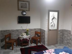 TV a/nebo společenská místnost v ubytování bedouin guest house