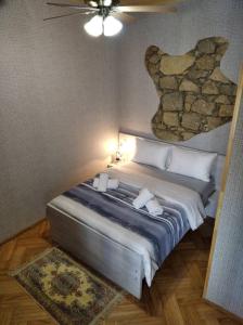 Postel nebo postele na pokoji v ubytování Guesthouse Litoros