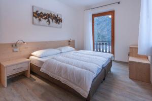 Postel nebo postele na pokoji v ubytování Casa Zulian