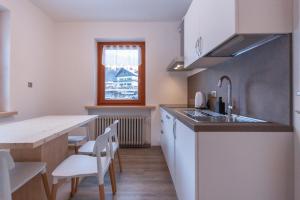 Kuchyň nebo kuchyňský kout v ubytování Casa Zulian