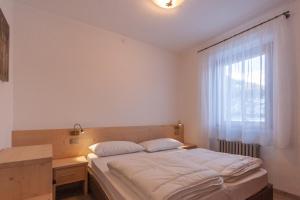 Postel nebo postele na pokoji v ubytování Casa Zulian