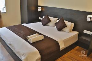 Voodi või voodid majutusasutuse Shiv Shakti Hostel toas