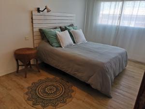 A bed or beds in a room at Casa Capricho