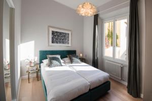 Posteľ alebo postele v izbe v ubytovaní Apartments Florence Oblate Exclusive View