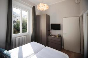Posteľ alebo postele v izbe v ubytovaní Apartments Florence Oblate Exclusive View