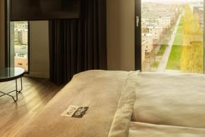 Posezení v ubytování Holiday Inn - the niu, Fender Amsterdam