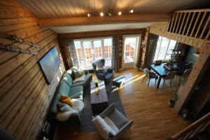 an overhead view of a living room and dining room at Lake View Apartment 2 bedrooms and loft in Stranda