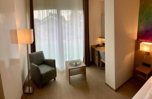 Ein Bett oder Betten in einem Zimmer der Unterkunft Thermalhotel Kemper