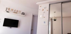 Televisyen dan/atau pusat hiburan di Studio apartman ENJOY Divčibare