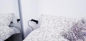 Katil atau katil-katil dalam bilik di Studio apartman ENJOY Divčibare