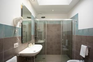 a bathroom with a sink and a shower at Podere40 Country Hotel in Porto Cesareo