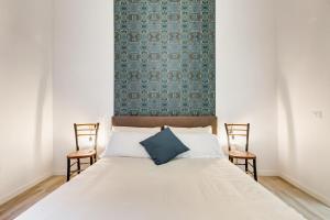 Voodi või voodid majutusasutuse BDC - Termini Sun Apartment toas