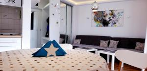 Katil atau katil-katil dalam bilik di Studio apartman ENJOY Divčibare