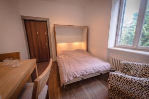 Postel nebo postele na pokoji v ubytování Chambres d'Hôtes Les Deux Hêtres