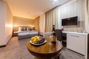 Postel nebo postele na pokoji v ubytování Hotel Berane