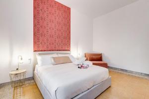 Voodi või voodid majutusasutuse BDC - Termini Sun Apartment toas