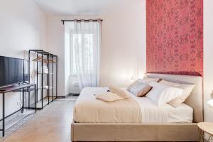 Voodi või voodid majutusasutuse BDC - Termini Sun Apartment toas