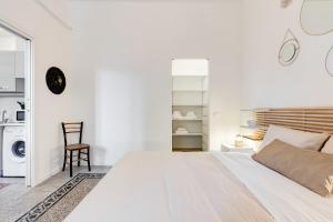 Voodi või voodid majutusasutuse BDC - Termini Sun Apartment toas
