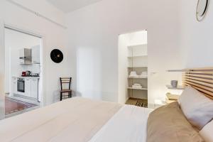 Voodi või voodid majutusasutuse BDC - Termini Sun Apartment toas