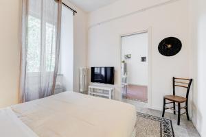 Televiisor ja/või meelelahutuskeskus majutusasutuses BDC - Termini Sun Apartment