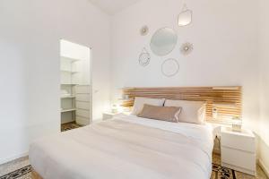 Voodi või voodid majutusasutuse BDC - Termini Sun Apartment toas