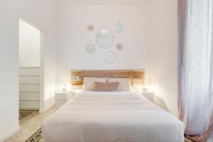 Voodi või voodid majutusasutuse BDC - Termini Sun Apartment toas