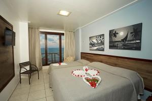 Katil atau katil-katil dalam bilik di Moriah Natal Beach Hotel +84 gambar