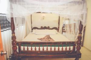 Letto o letti in una camera di VILLA No34 HIKKADUWA