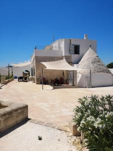 Foto dalla galleria di Dimora Verde B con trullo Masseria Poesia a Cisternino