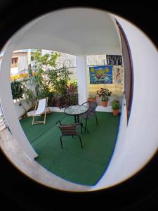 a circular view of a patio with a table and chairs at Villa Kate in Las Terrenas