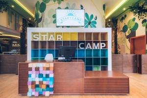 a star canop store with a colorful tiled counter at Iberostar Paraíso Beach in Puerto Morelos