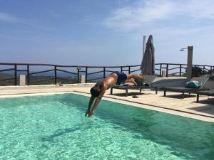 Bazén v ubytování Hotel Castello Budoni nebo v jeho okolí