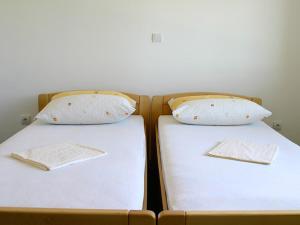Posteľ alebo postele v izbe v ubytovaní Rooms Medved