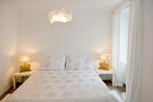 Ένα ή περισσότερα κρεβάτια σε δωμάτιο στο Hotel Bellevue